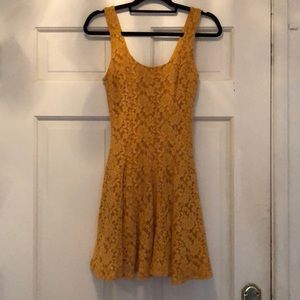 Goldfinch yellow lace overlay dress.